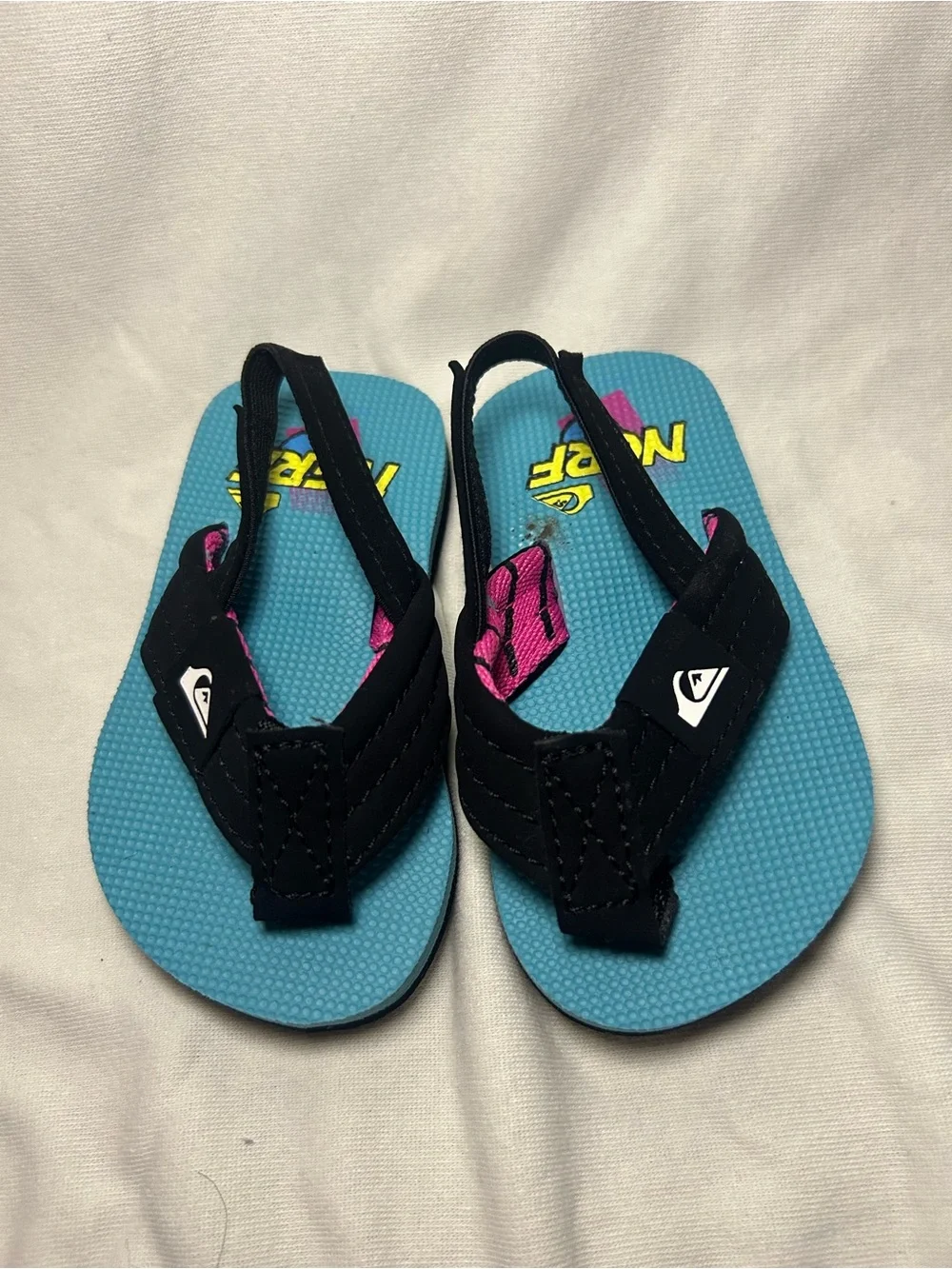 Nerf Kids Blue and Black Flip Flops with Pink Accent
